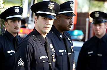 Keanu Reeves wearing an authentic LAPD uniform in Street Kings
